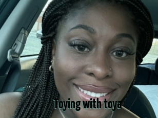 Toying_with_toya